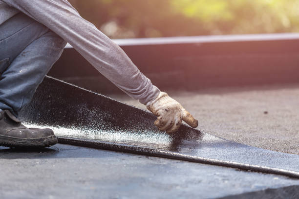 Professional Waterproofing technician working in Hamburg, MI